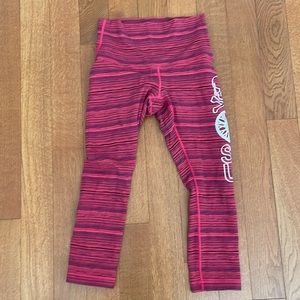Red and black SoulCycle x lulu leggings